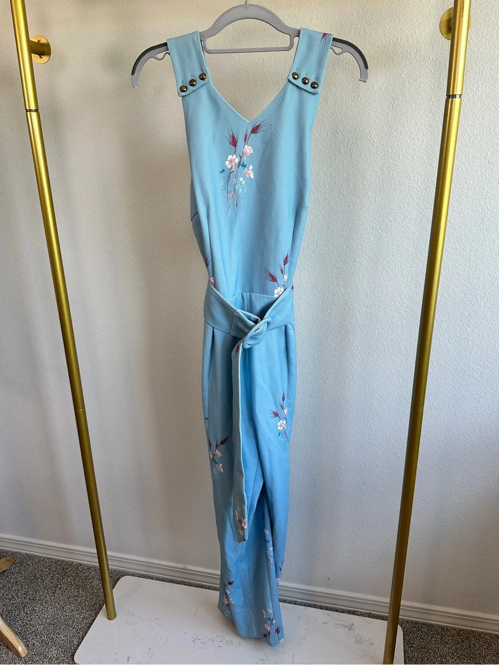 Elliatt Light Blue Floral Jumpsuit with Pink Floral Accents - Picture 1 of 13